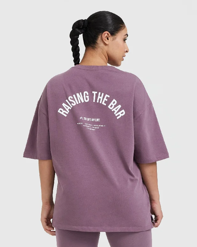 Raising The Bar Graphic Unisex T-Shirt | Vintage Purple